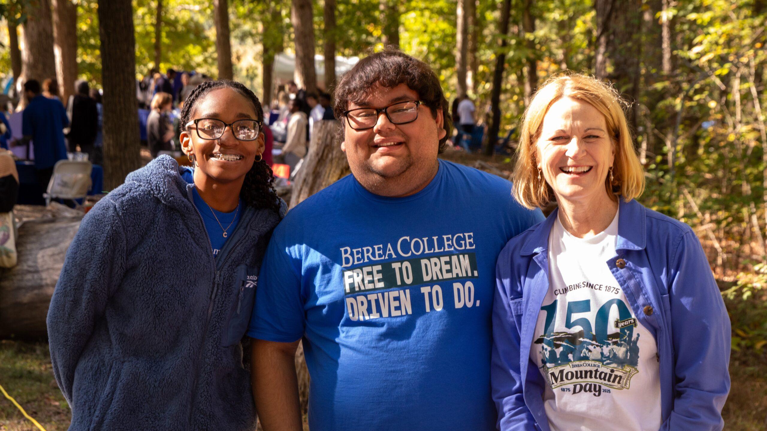 Two members of the Student Government Association posing with the Berea College president, Dr. Cheryl Nixon.